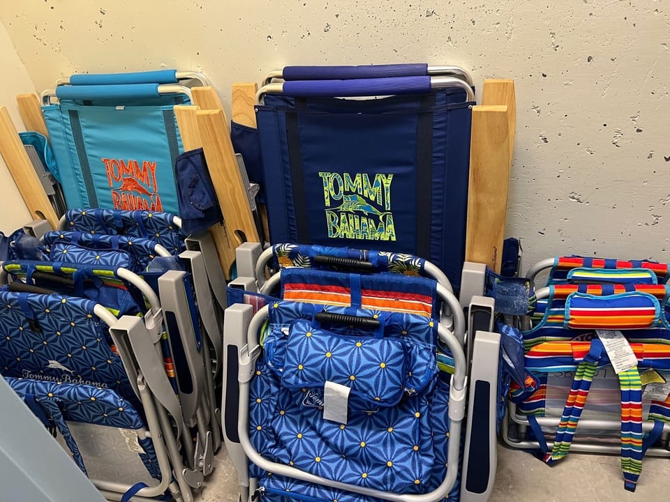 No need to pack the car or buy beach chairs here, the beach storage closet includes Tommy Bahama chairs and umbrellas for your use.