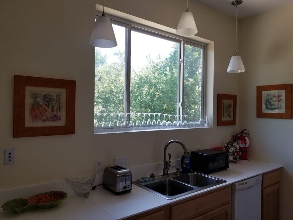 Kitchen window is 6 feet by 4 feet high facing south.  . 
