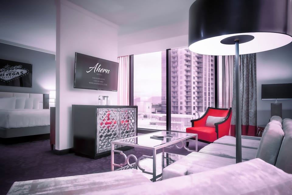 Signature Suite | Living area | 42-inch flat-screen TV with satellite channels, TV