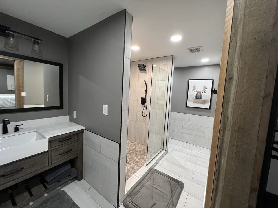 Enjoy your own private space in this separate master ensuite bathroom. Total luxury with walk-in shower.