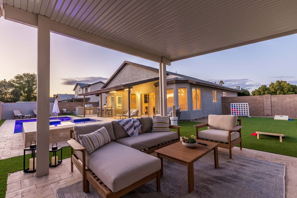 Outdoor Pergola, Sofa, and 75” Smart TV to stream your favorite shows!