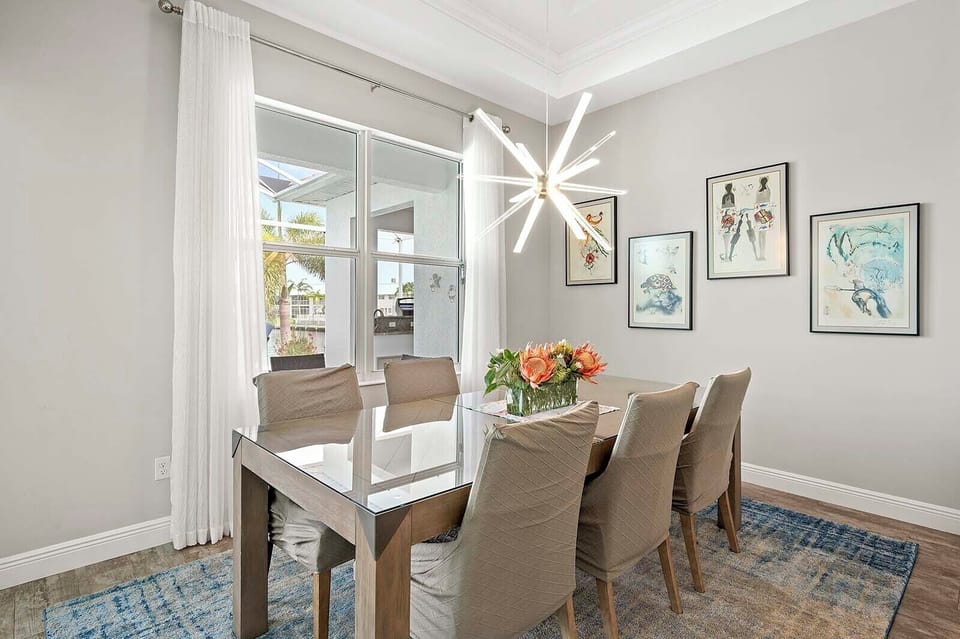 Formal Dining Area with Pool/Patio Views