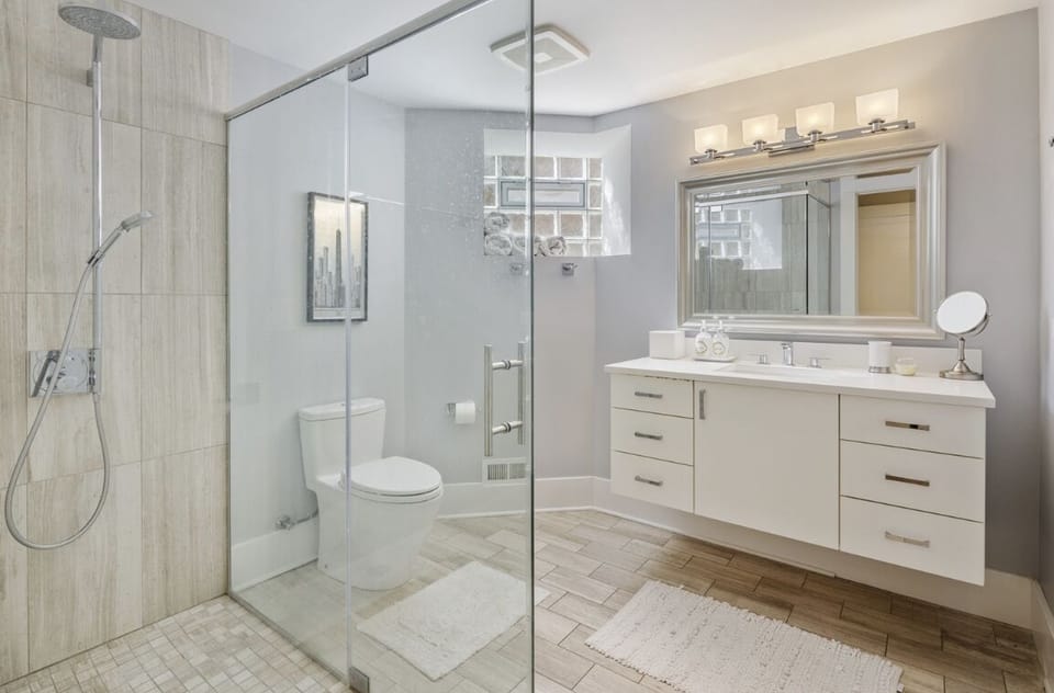 Master bathroom with walk-in steam shower 