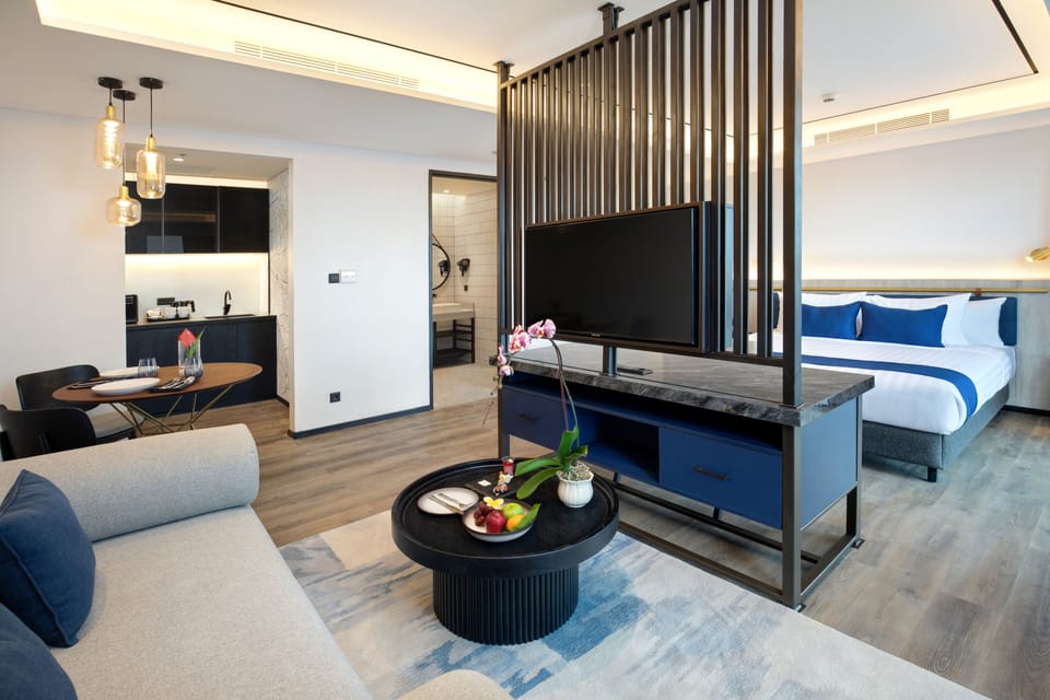 Junior Single Room, 1 Bedroom | Living area | 43-inch flat-screen TV with cable channels, TV