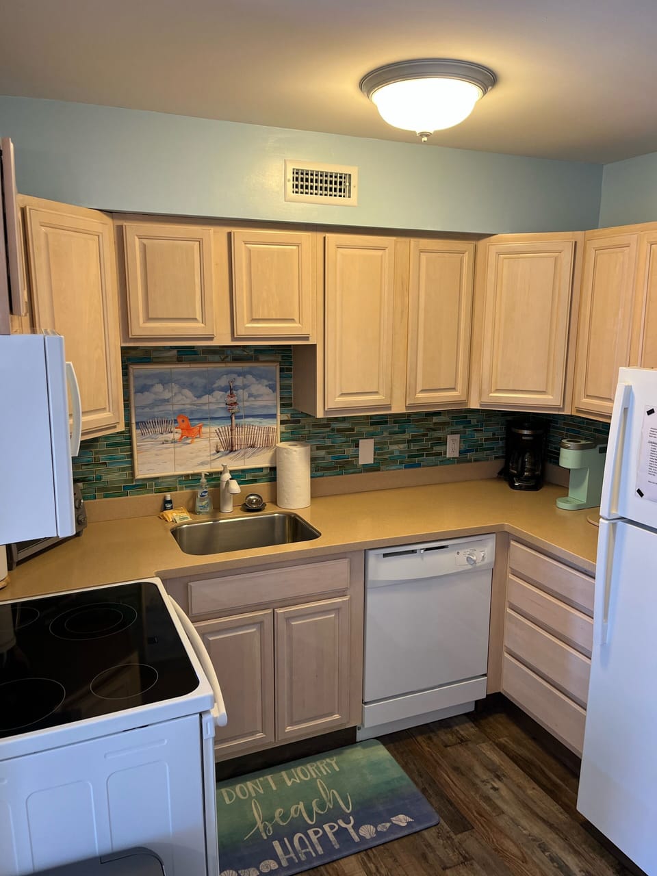 Fully stocked kitchen with toaster oven, Keurig and traditional coffee maker