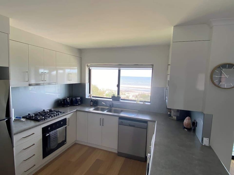 Wow look at that beach view from the kitchen window