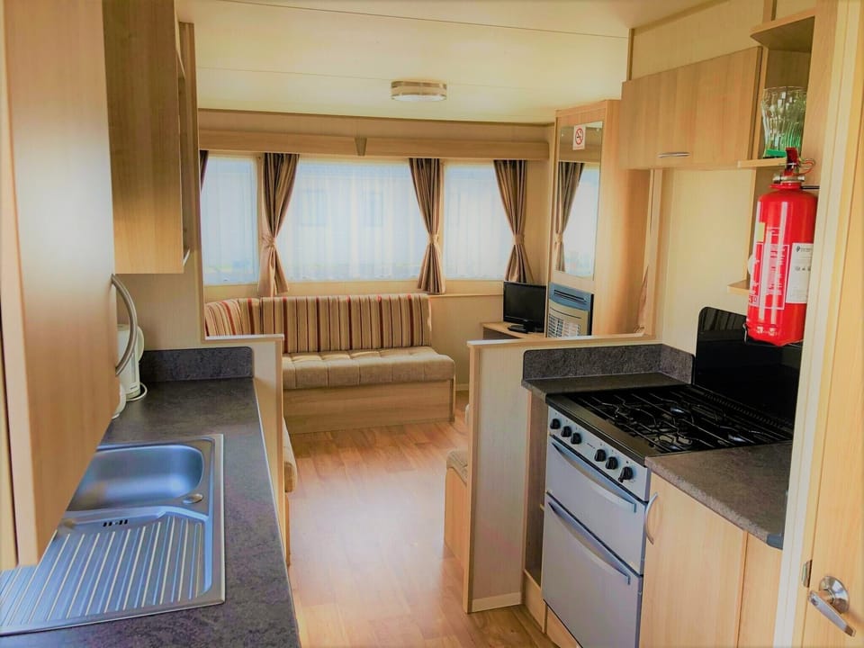 Standard Mobile Home | Living area | 20-inch flat-screen TV with digital channels, TV