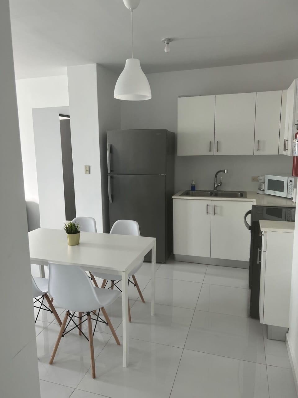 Basic Apartment | Private kitchen | Full-size fridge, microwave, cookware/dishes/utensils