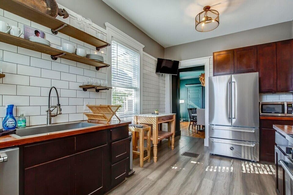 Gourmet Kitchen with Imported italian appliances. Open to large dining, game, and bourbon tasting room. 