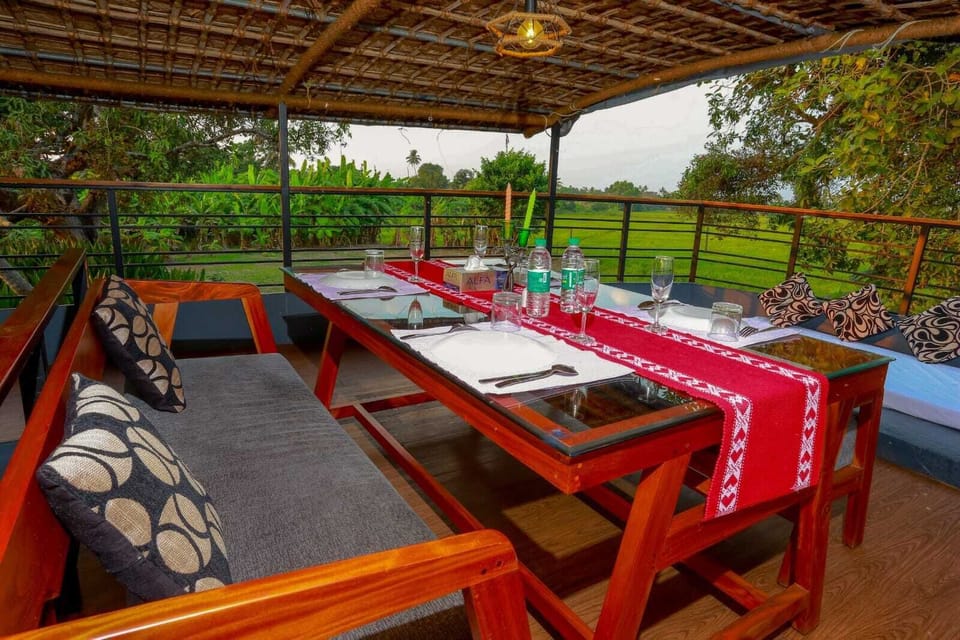 Deluxe Double Room | Living area | Flat-screen TV, printers
