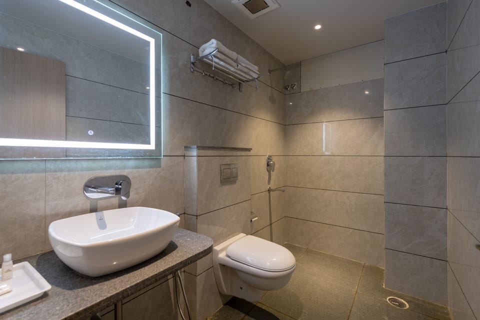 Shower, free toiletries, towels, soap