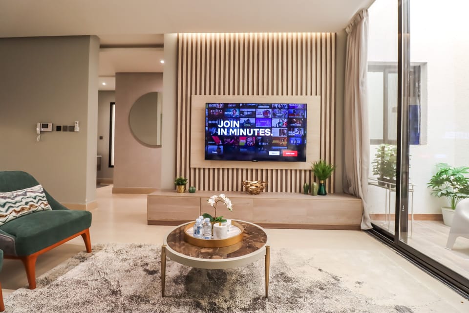Apartment, 3 Bedrooms | Living area | 32-inch LCD TV with cable channels, TV