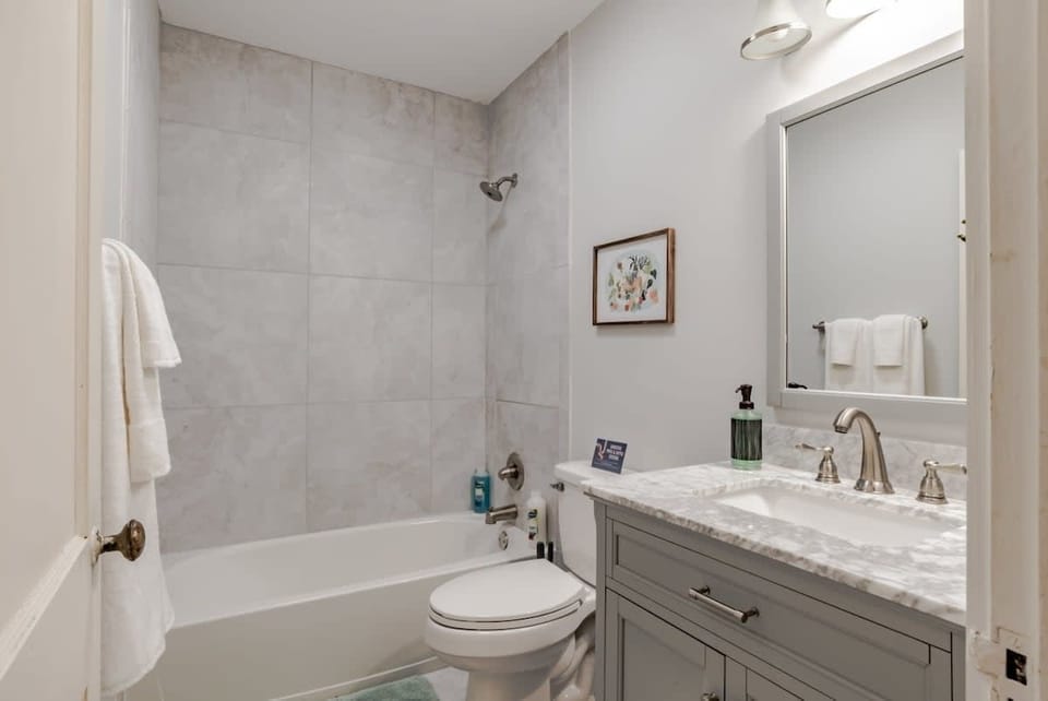 Bathroom with shower and tub