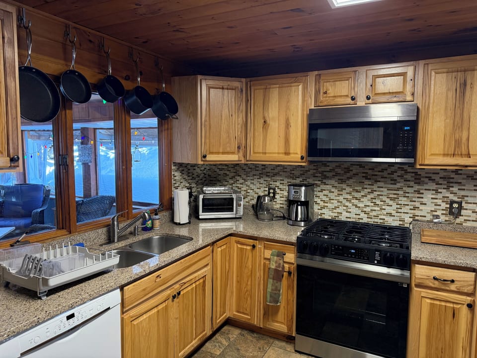 Kitchen is equipped with all the essential to make your favorite meals.