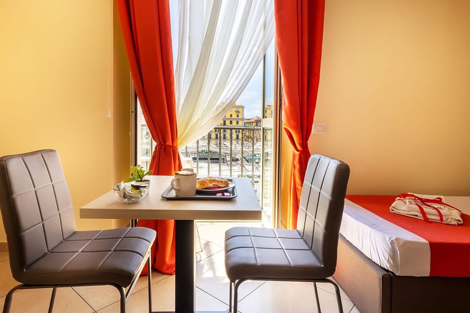 Panoramic Quadruple Room | Minibar, in-room safe, desk, laptop workspace