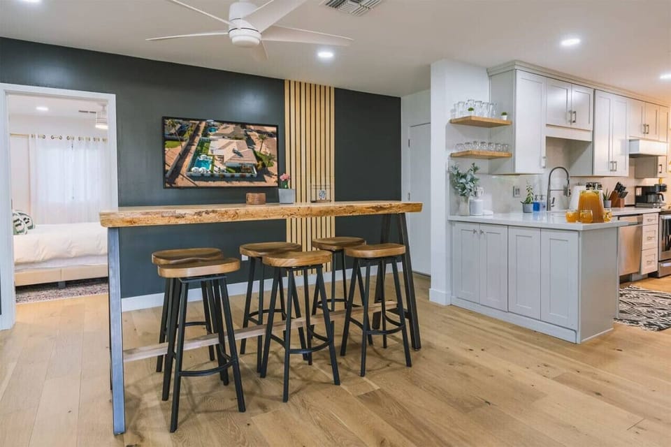 Additional high top in Dining Area with 55` TV