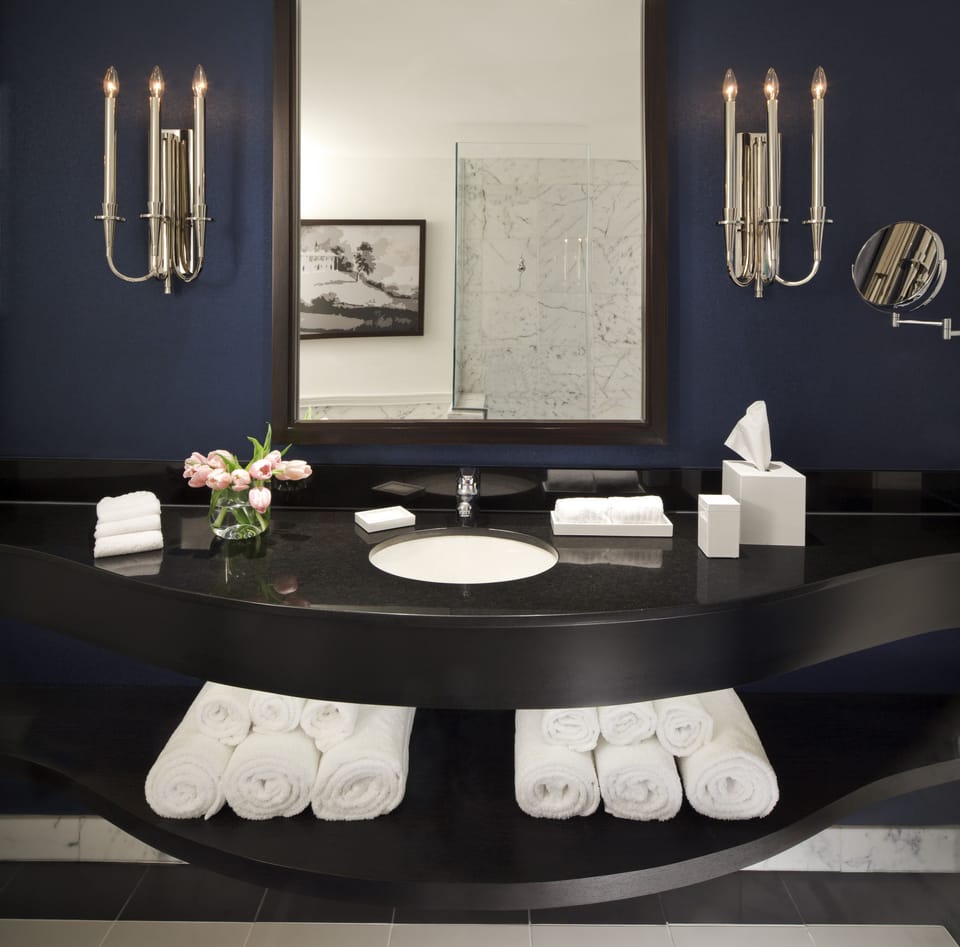 Combined shower/tub, designer toiletries, hair dryer, bathrobes