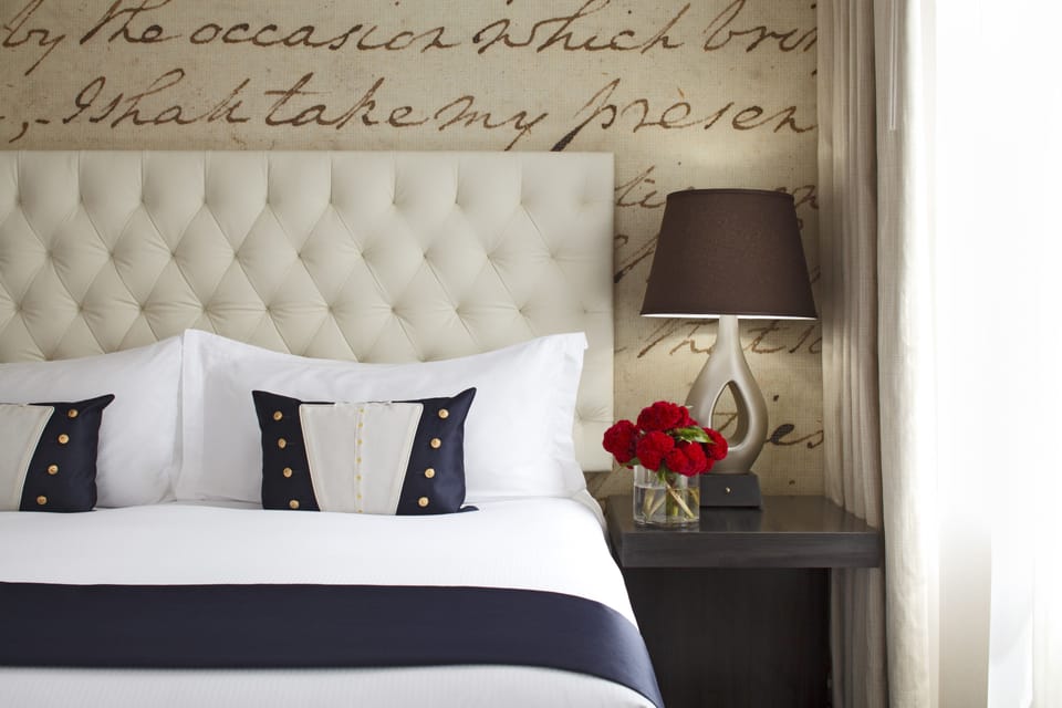Frette Italian sheets, premium bedding, down comforters, minibar