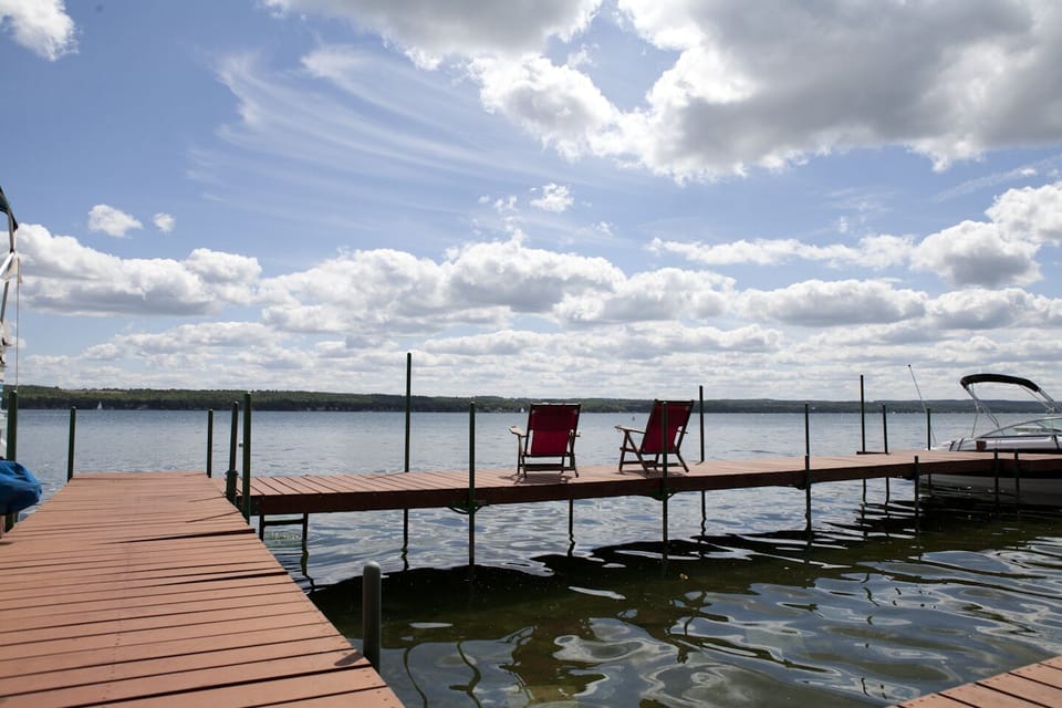 Long private dock with plenty of room for sitting as well as tying up your boat
