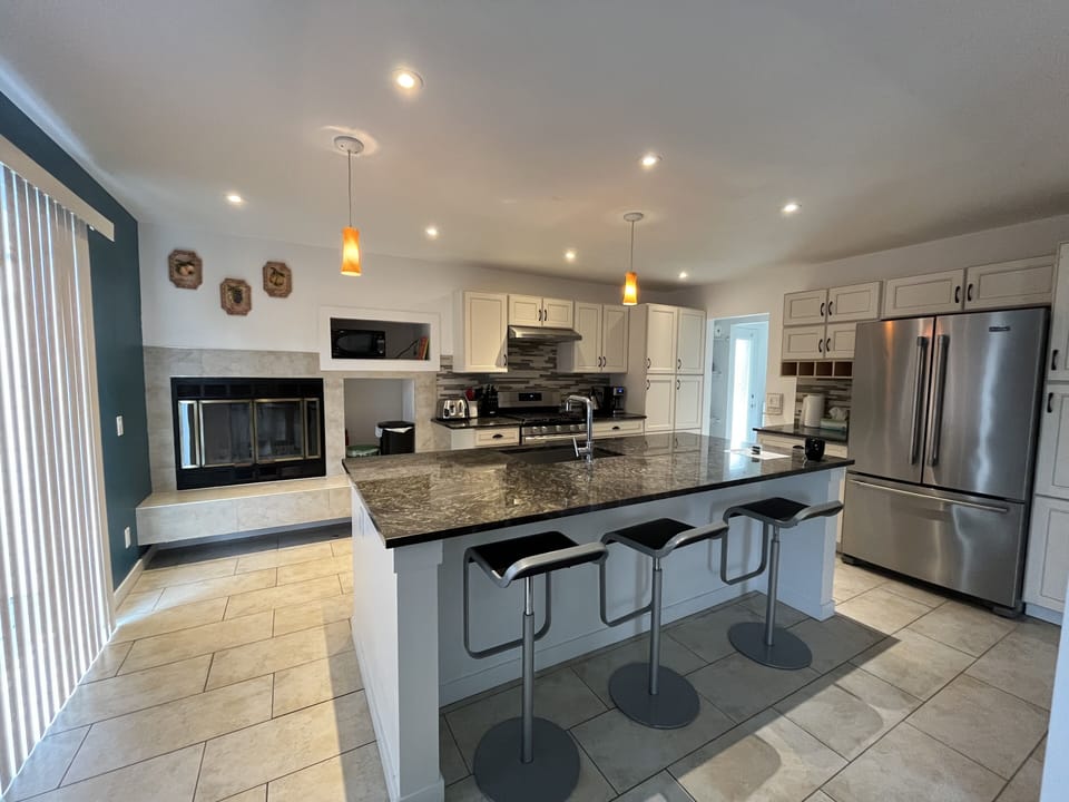 Kitchen with wood burning fireplace 