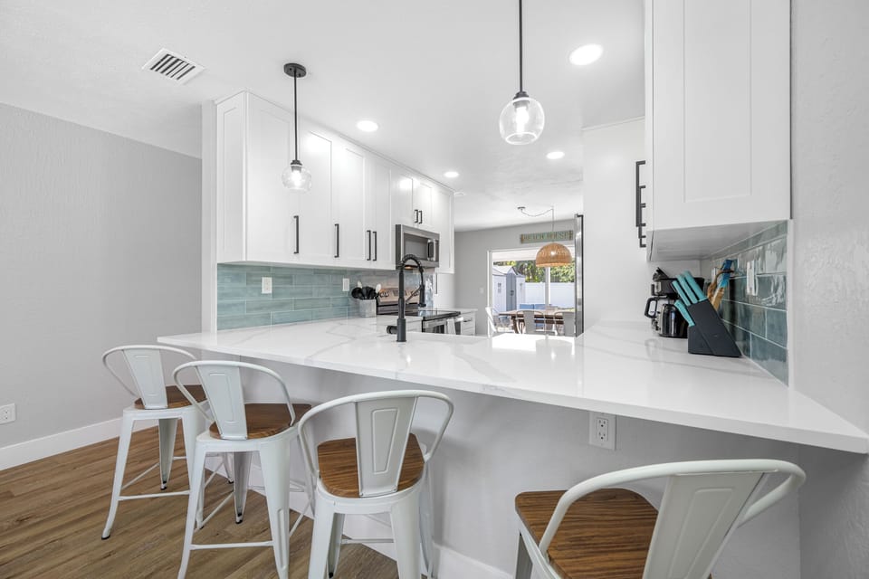 Salty Air's Sleek Kitchen with Bar Seating