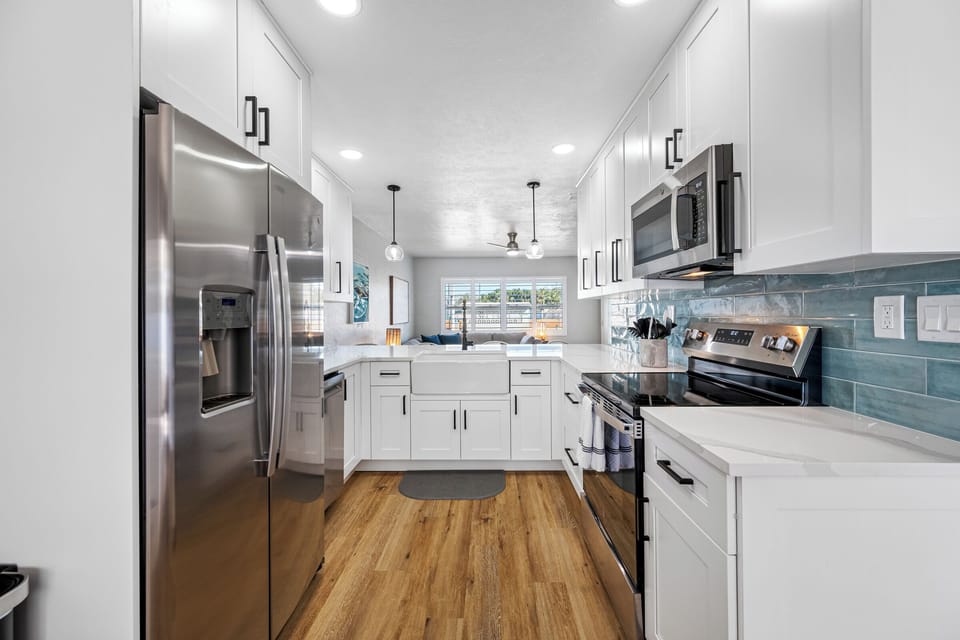 Salty- Fully equipped kitchen with stainless steel appliances.