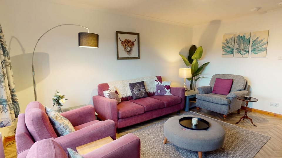 Relax in the living room at Burnside Pines