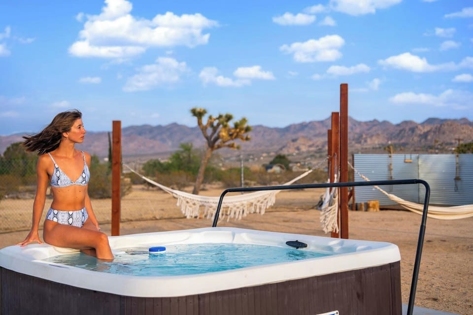 Relax in the hot tub with wide-open desert views.