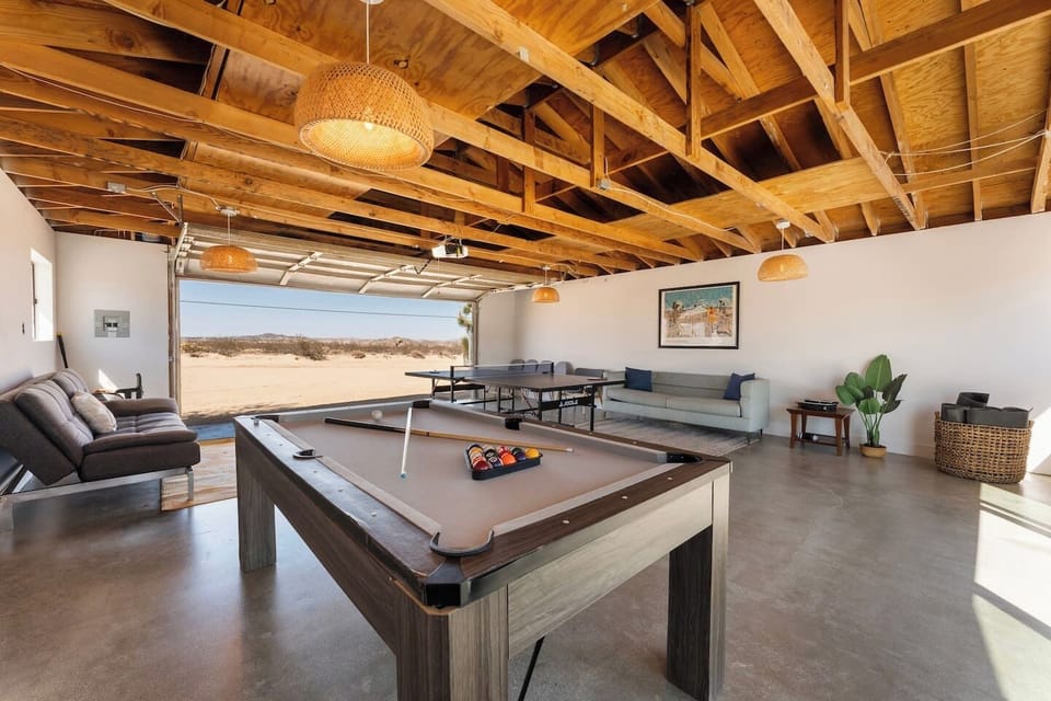 Game garage with desert views, where pool, ping-pong, and pure relaxation come together.