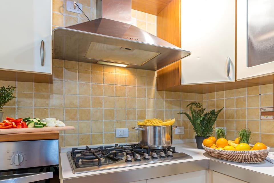 Family House, 2 Bedrooms, 2 Bathrooms (Domos Pintadas Cottage Rosa) | Private kitchen | Stovetop, dishwasher, electric kettle, dining table