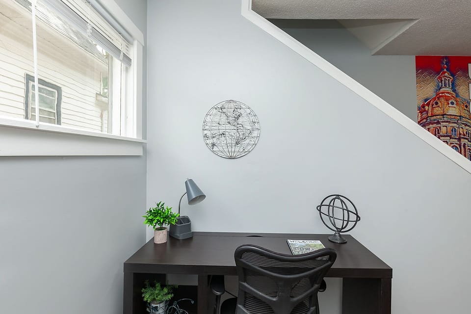 Dedicated work space. On the main level, right inside the front door. 