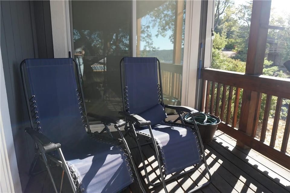 Two ergonomic lounge chairs are a nice place to read a book.