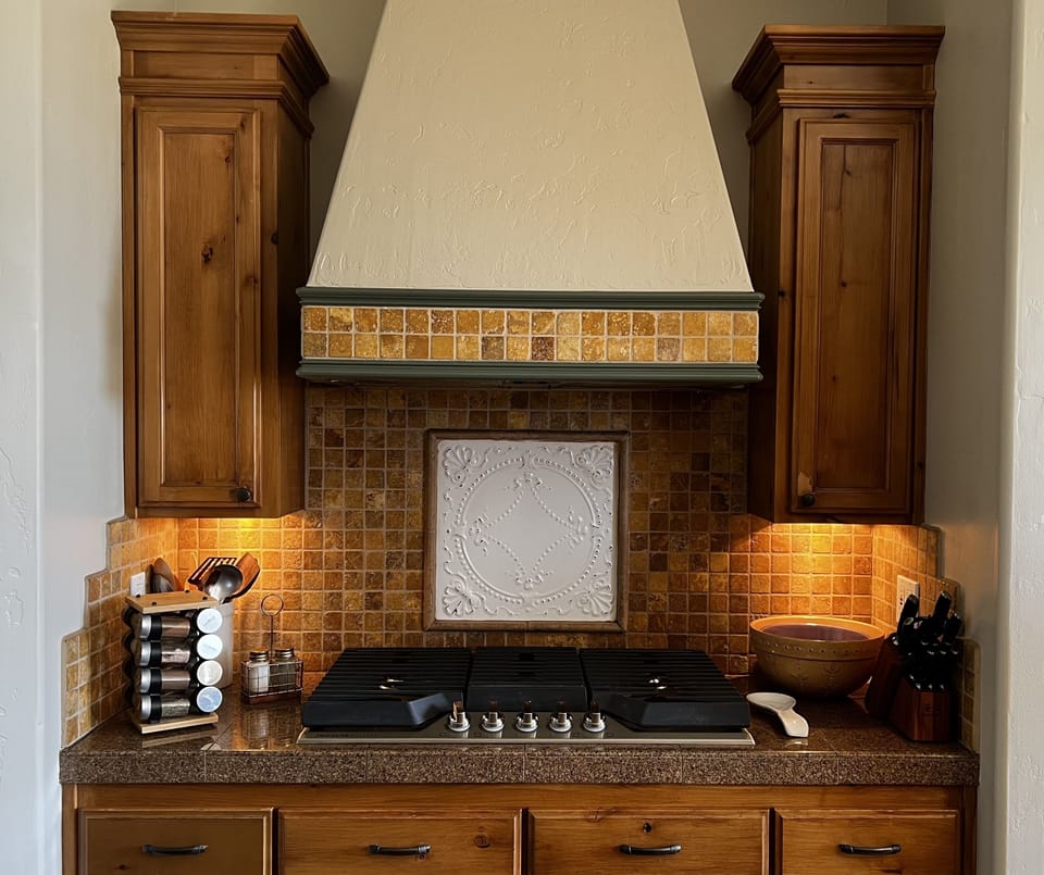 Custom built knotty alder cabinets bring in the outdoors.