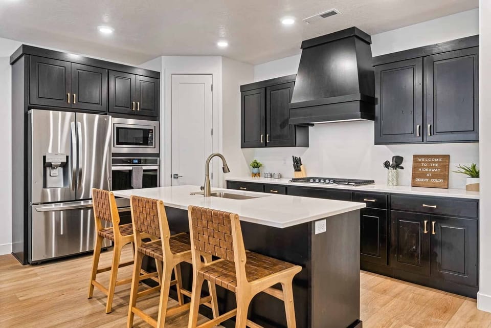 Townhome, 4 Bedrooms | Private kitchen | Fridge, oven, coffee/tea maker, toaster