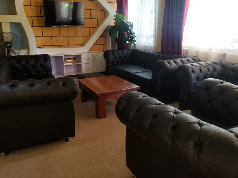 Superior Room | Living area | 50-inch Smart TV with digital channels