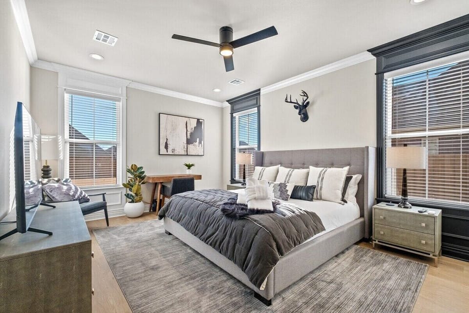 Our Master bedroom is complete with a King-size bed, HUGE walk-in closet, dresser, 49-inch Samsung Smart TV, desk with chair and stunning en suite bath with tiled shower and free-standing tub.