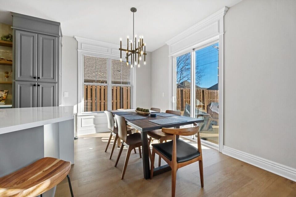 Through the main living space, you'll find our 6-top dining table and kitchen!
