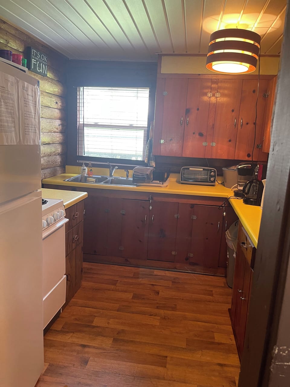 Kitchen stocked w/dishes, towels, oven/range, coffee pot, microwave, fridge