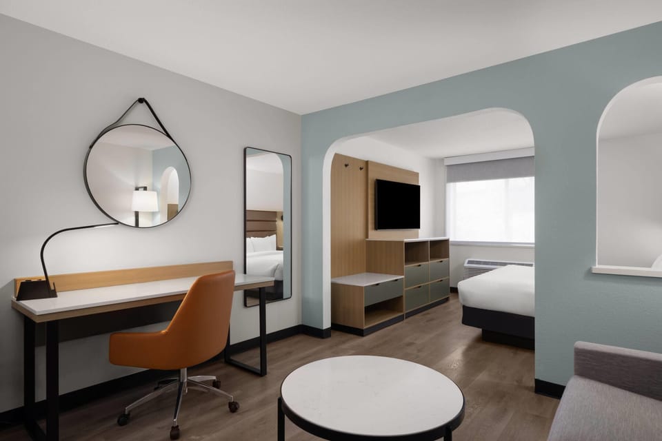 Suite, 1 King Bed, Non Smoking | Premium bedding, down comforters, pillowtop beds, desk