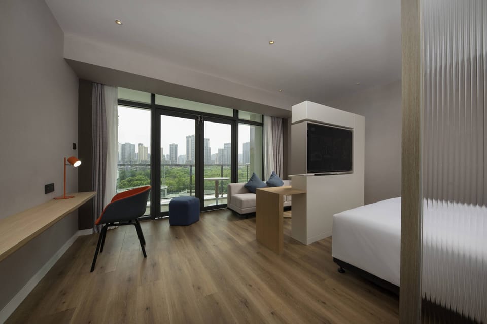 Standard Room, 1 King Bed with Sofa bed (Extra Floor Space) | In-room safe, desk, soundproofing, iron/ironing board