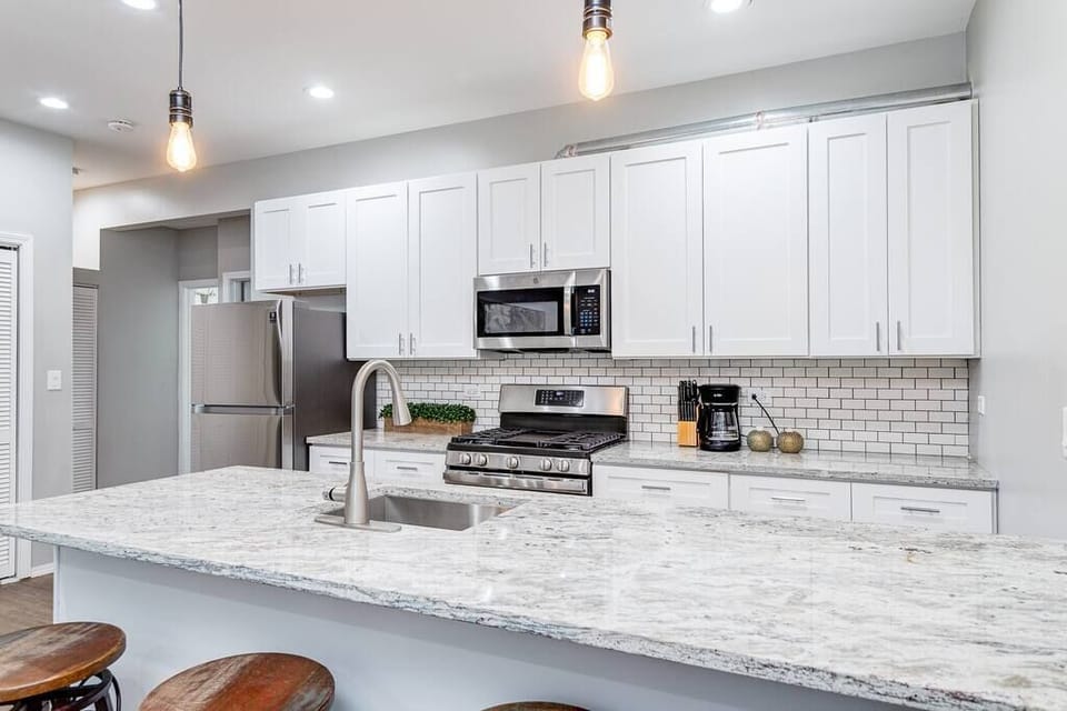 Living Room / Fully stocked kitchen