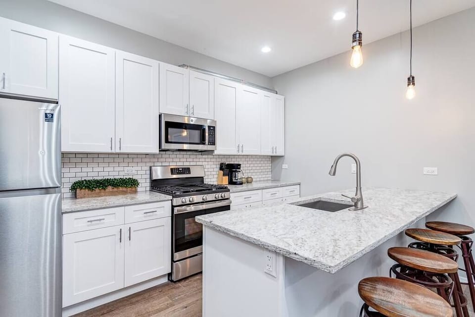 Living Room / Fully stocked kitchen