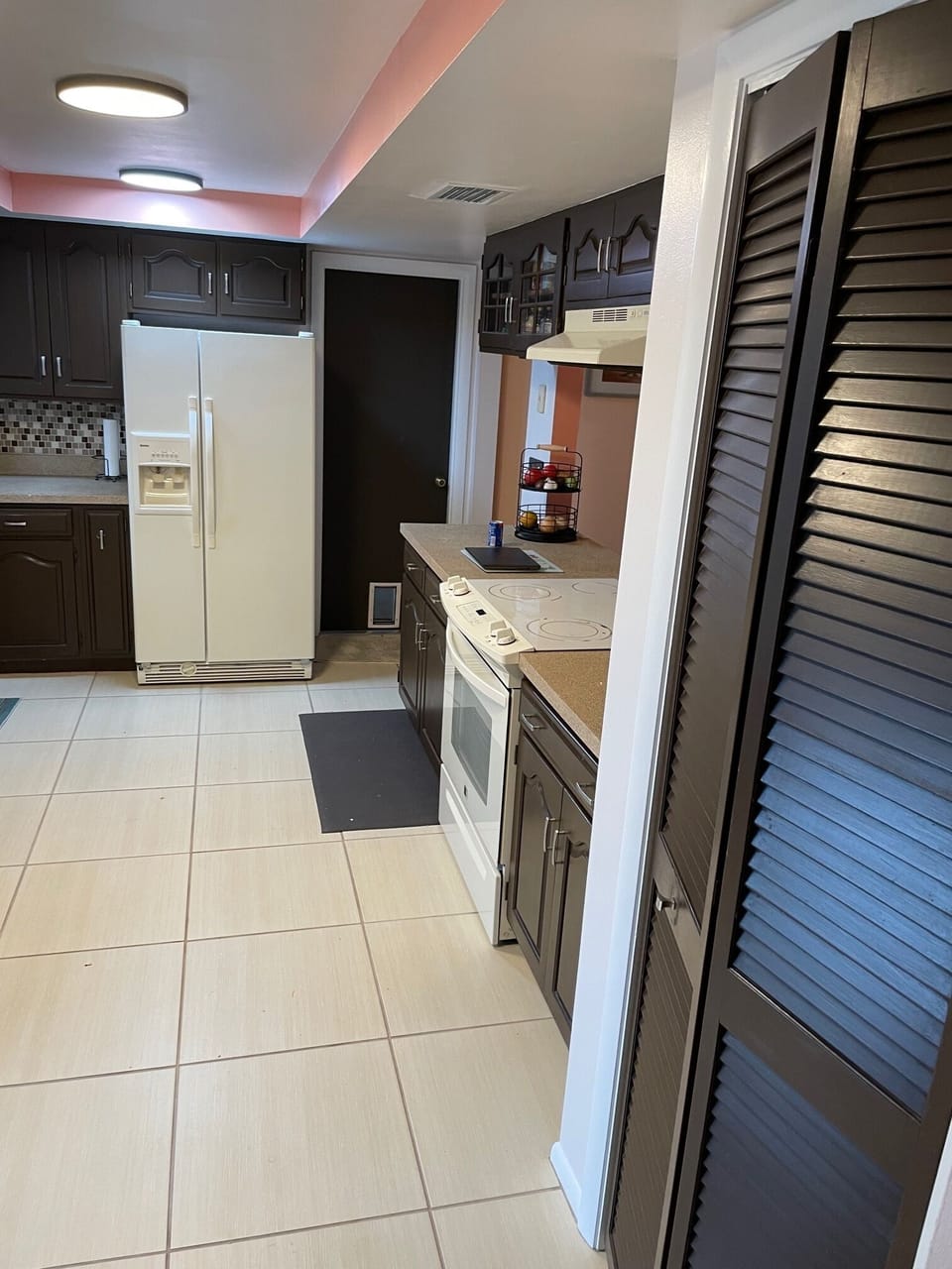 Full Kitchen with lookout to dining room