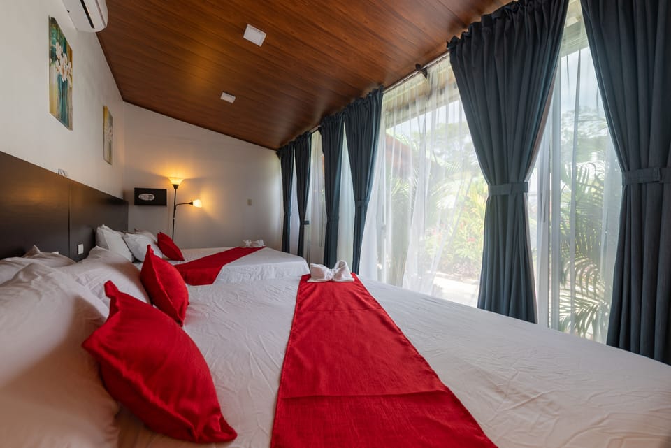 Bedroom 4: King bed, private bathroom and A/C unit