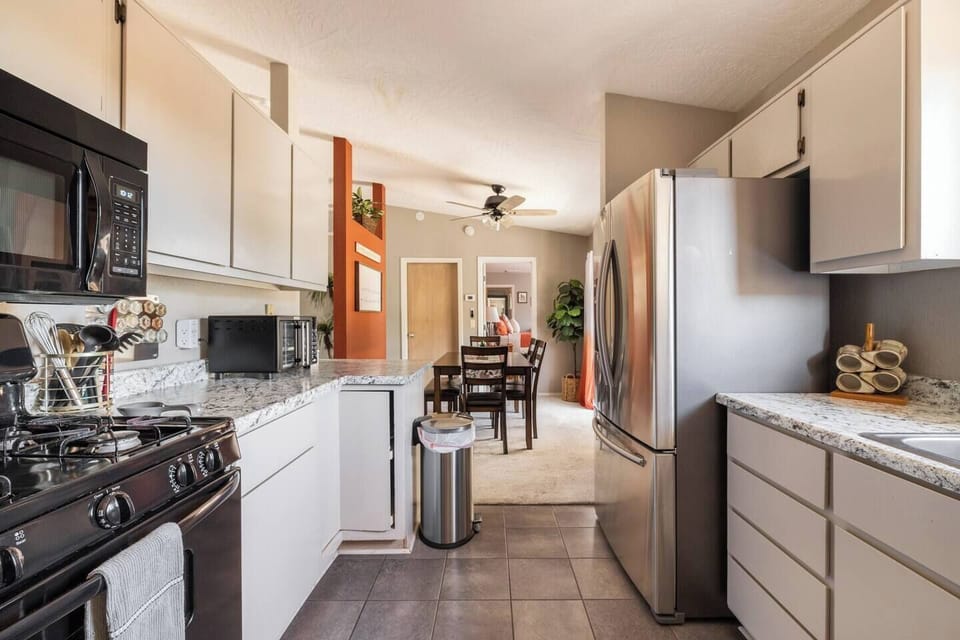 Kitchen is stocked with all the comforts of home, utensils, pots & pans, coffee maker & coffee as well as a 3-in-1 blender/food chopper.  We have provided a Keurig machine, a drip coffee machine, a French press and even an electric kettle with assorted tea