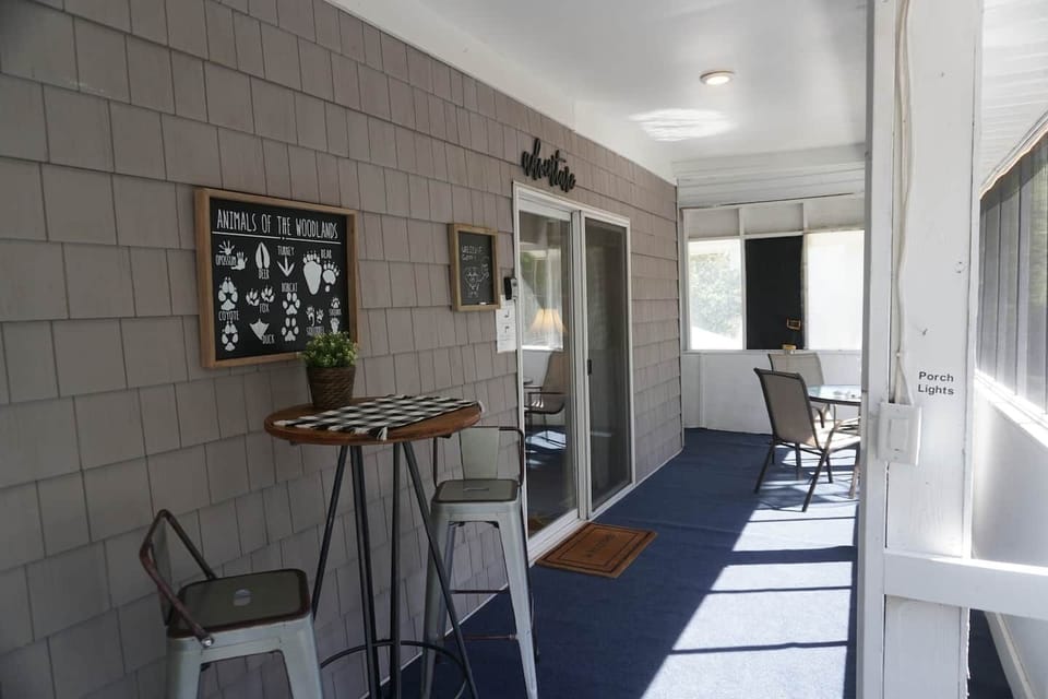 Relaxing wrap around porch with lots of seating