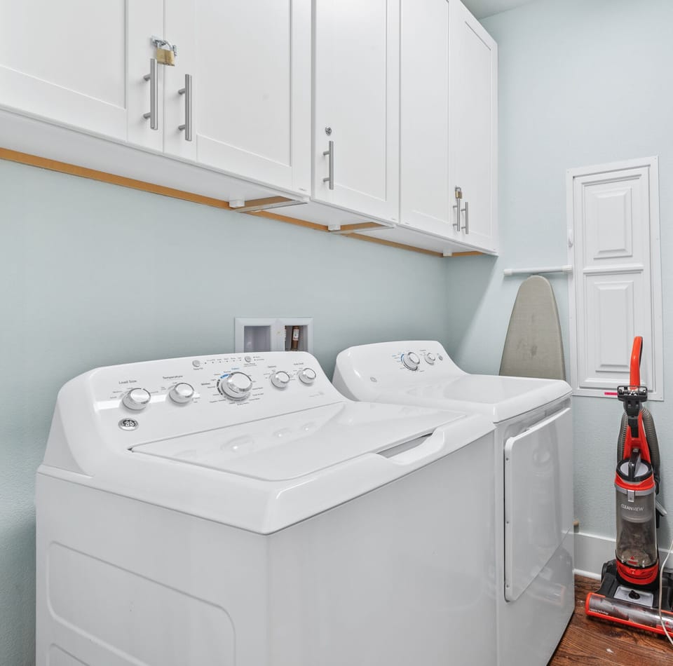 Laundry room with full size washer and dryer