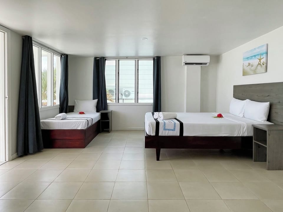 Family Room, 1 Bedroom, Partial Ocean View | Free WiFi