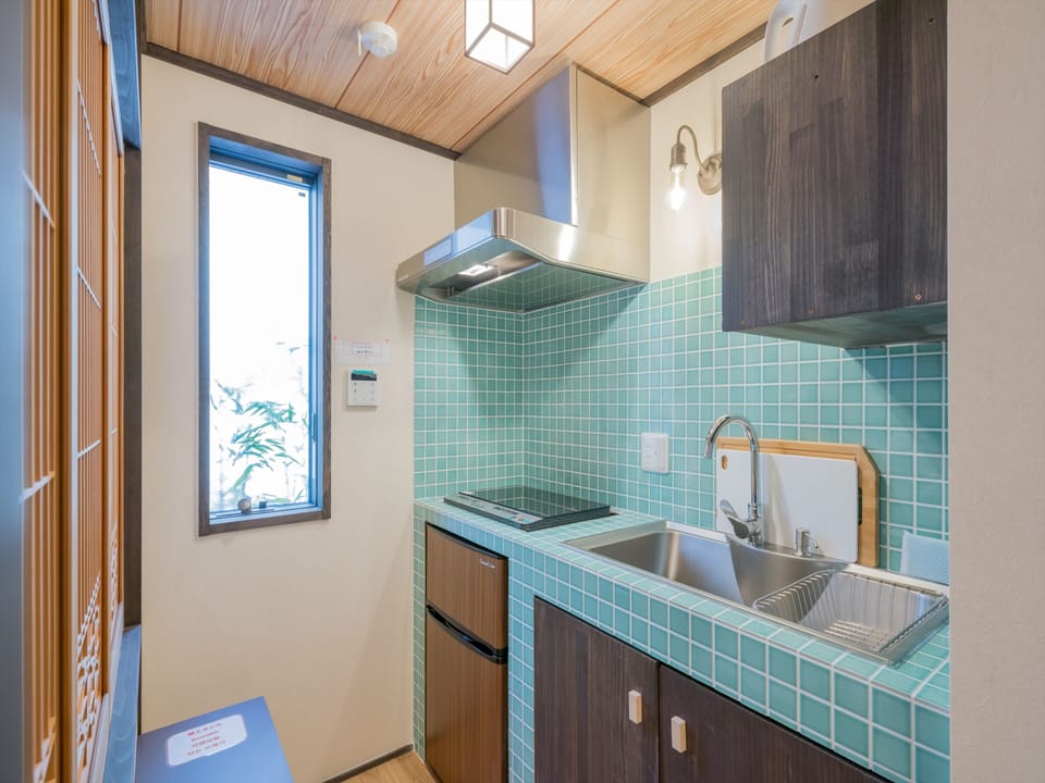House, 1 Bedroom | Private kitchen | Full-size fridge, microwave, stovetop, rice cooker