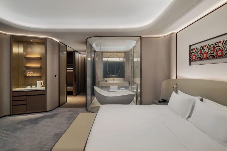 Separate tub and shower, rainfall showerhead, hair dryer, bathrobes
